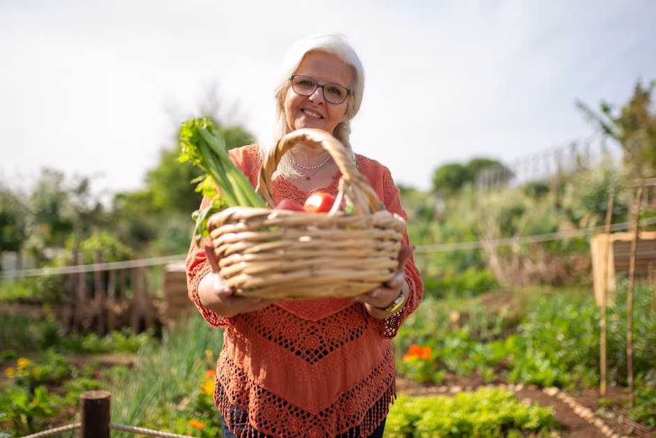 older woman gardening backyard saude