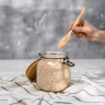 elderly woman cooking porridge kitchen Saúde e Bem-estar